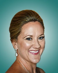 A smiling woman with blonde hair styled in an updo wears elegant earrings. She has a warm expression against a teal background, suggesting a professional or celebratory context.