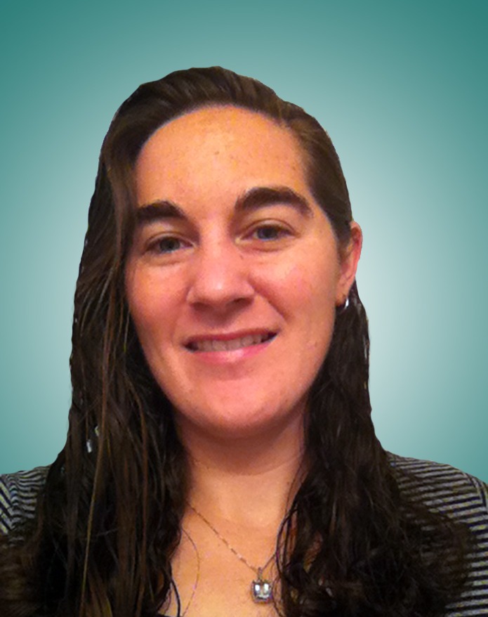 Smiling person with wet, wavy hair in front of a teal background. A silver necklace is visible, emphasizing a friendly, approachable demeanor.